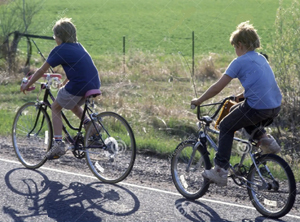 Harry and Draco riding bicycles